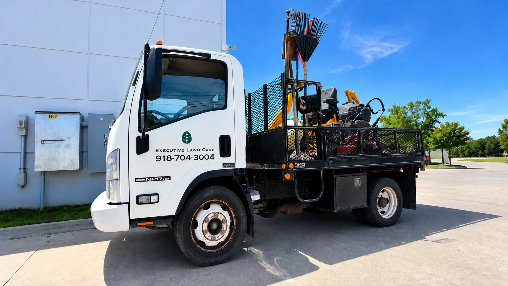 Executive Lawn Care truck with lawn care equipment